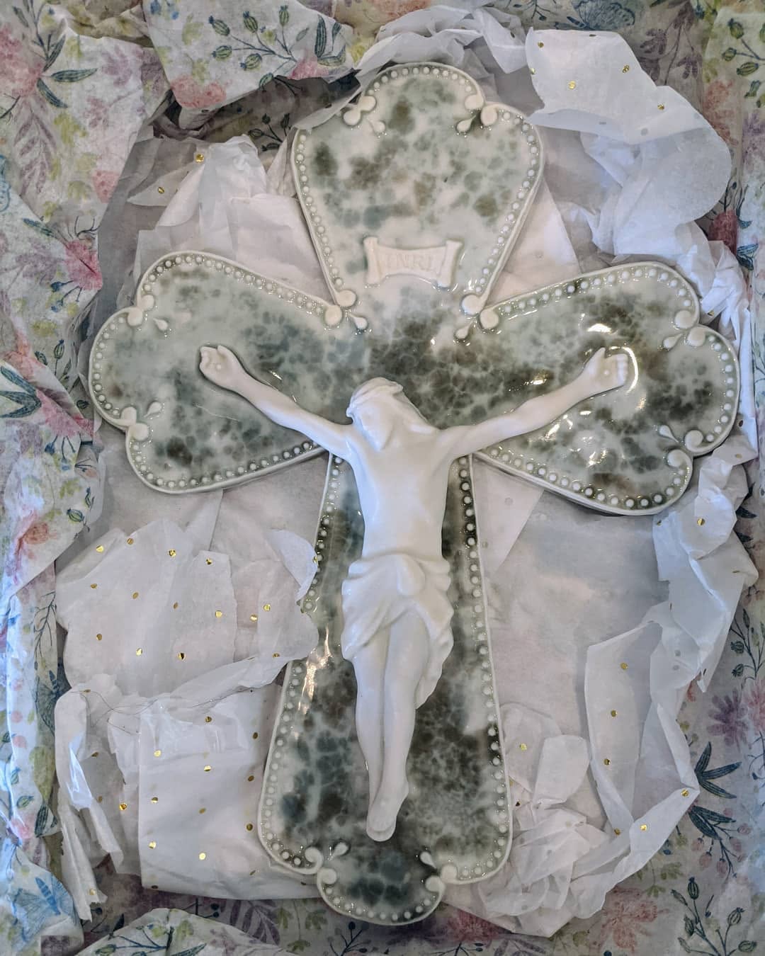 Handmade porcelain crucifix by Cate Ranieri, glazed and kiln-fired